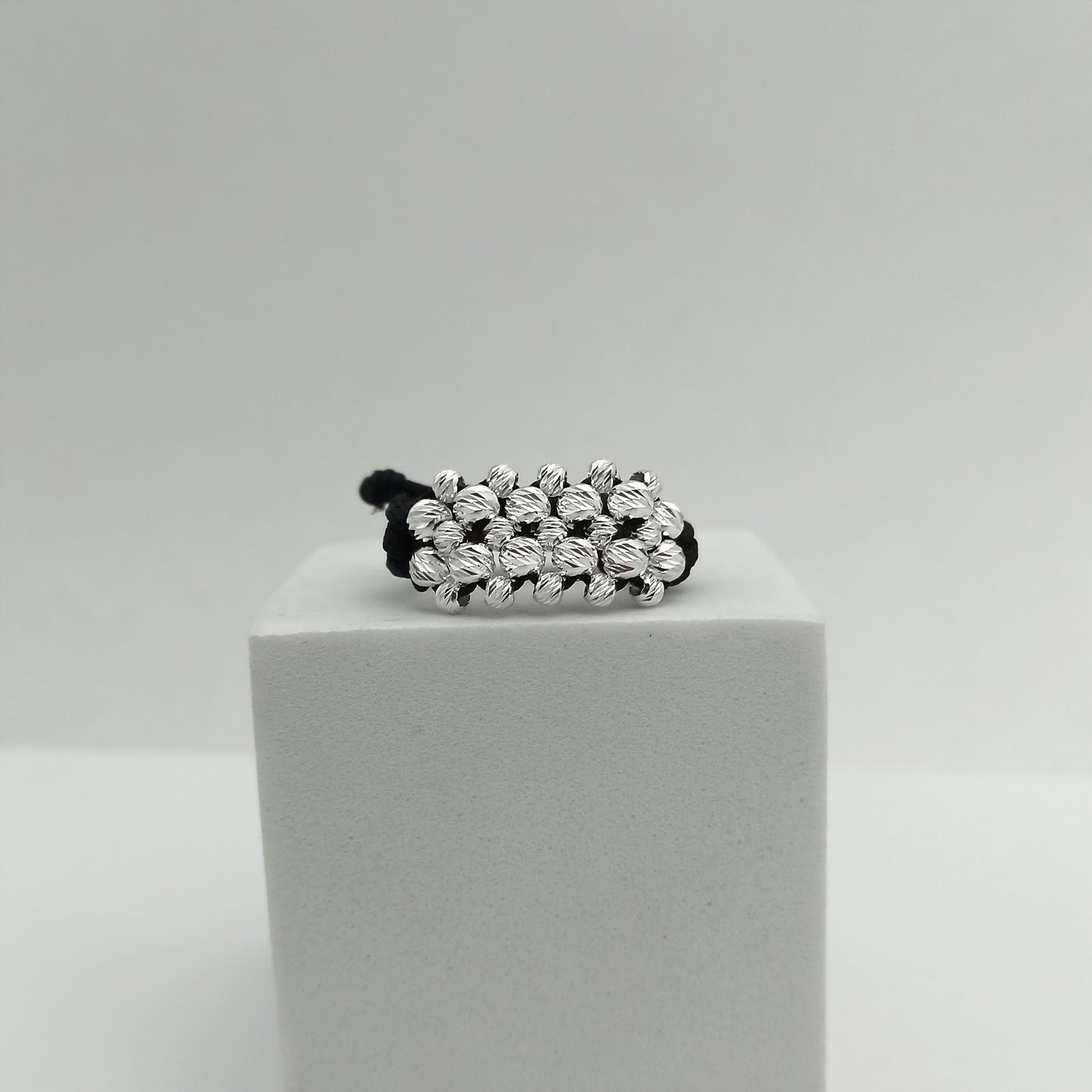 ATP01 - Anillo Tejido con balines Diamantados
