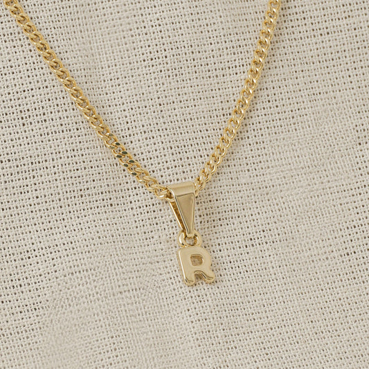 26360R - Dije Silueta Letra R Lisa Mini