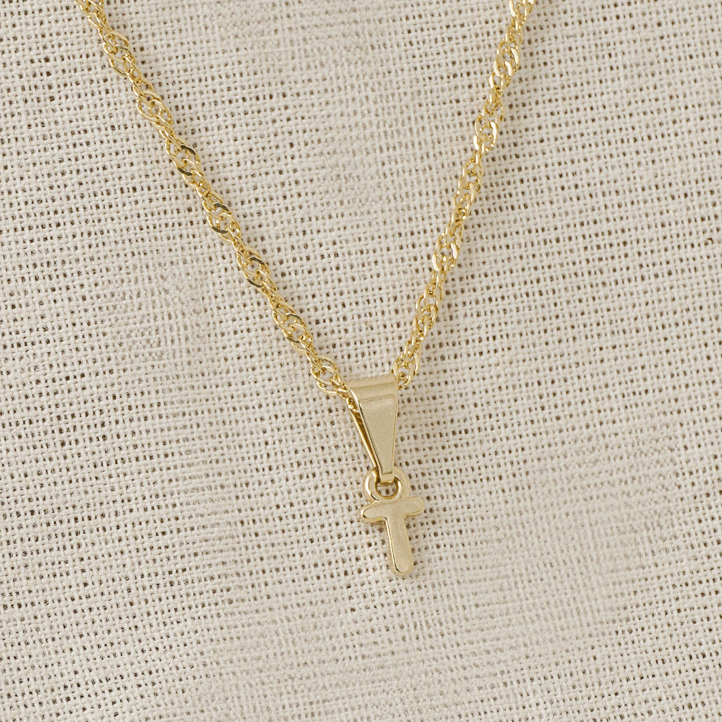 26360T - Dije Silueta Letra T Lisa Mini