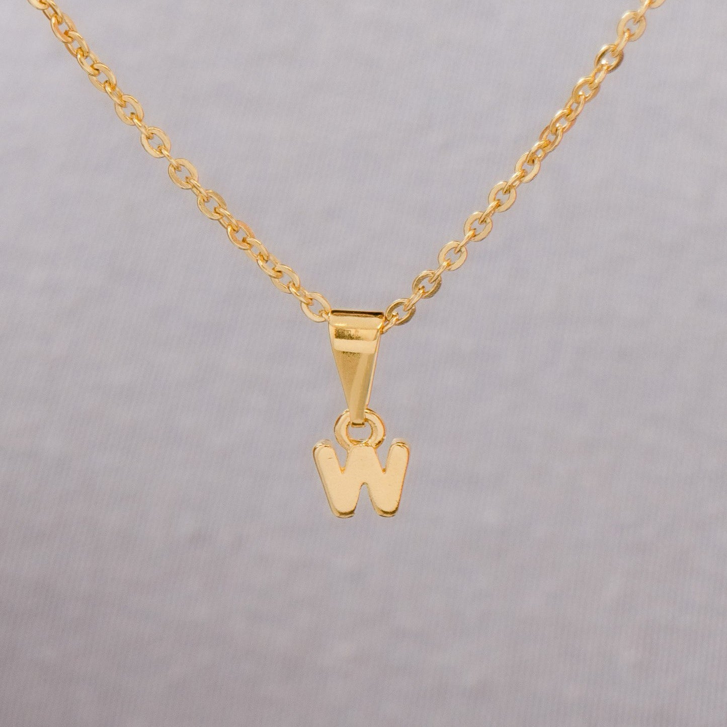 26360W - Dije Silueta Letra W Lisa Mini