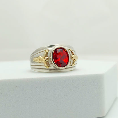 Anillo Cristos Plata y Oro con Circon Rojo Ovalado