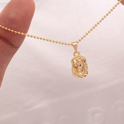 24552 - Dije Rostro Mediano Tallado