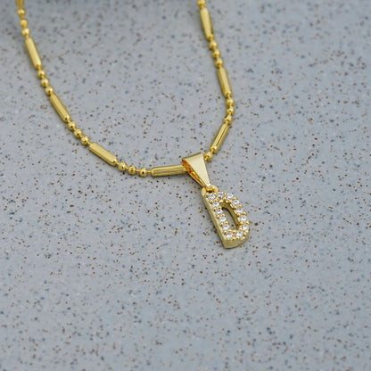 23370D - Dije Silueta Letra D Mediana Con Circones