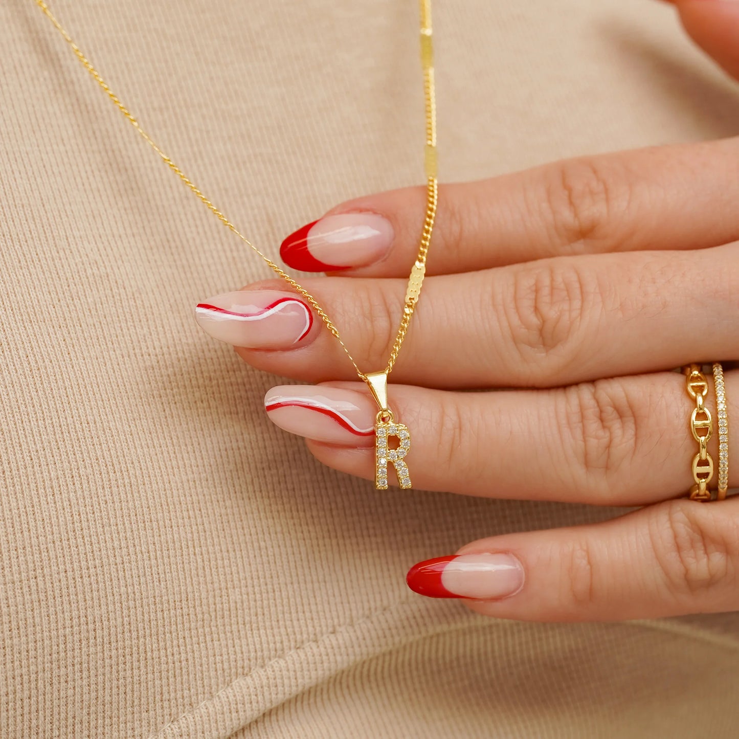 23370R - Dije Silueta Letra R Mediana Con Circones