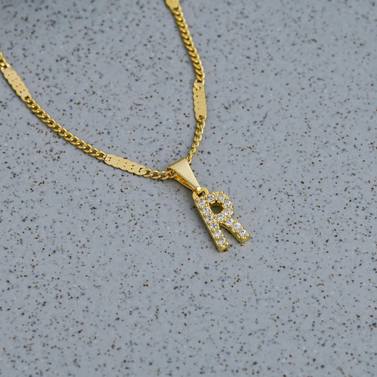 23370R - Dije Silueta Letra R Mediana Con Circones