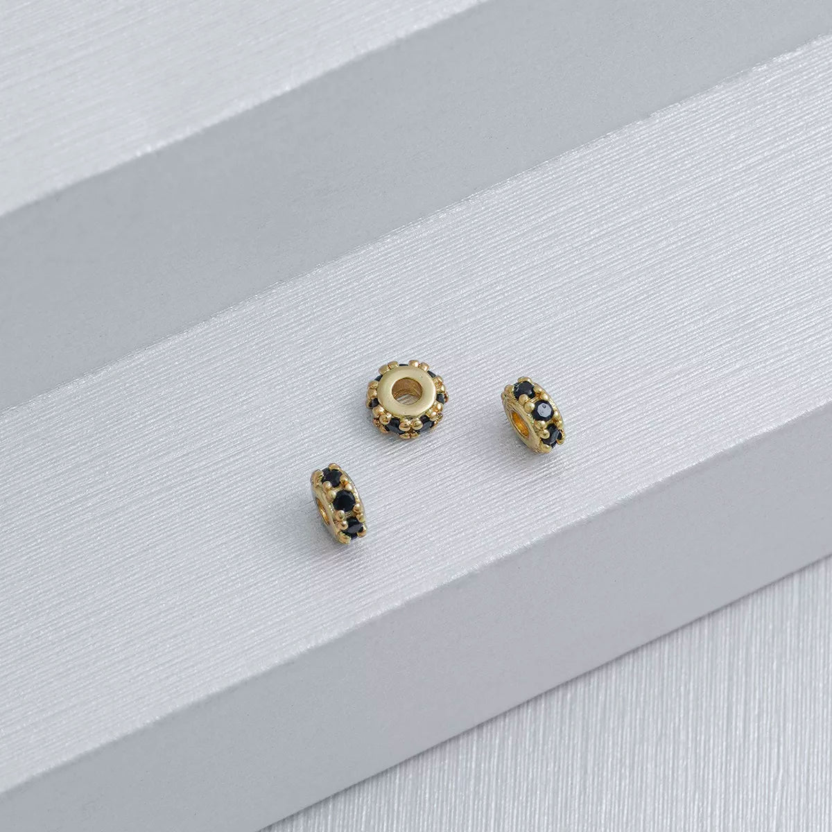 24799N - Herraje Rondel circonias x 3 Negro