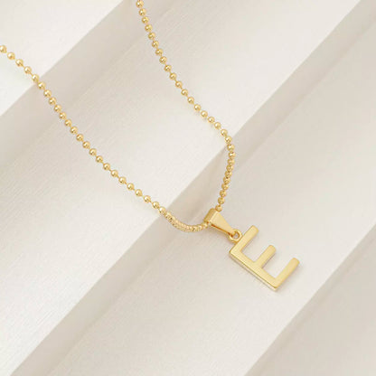 25360E - Dije Silueta Letra E Lisa Grande