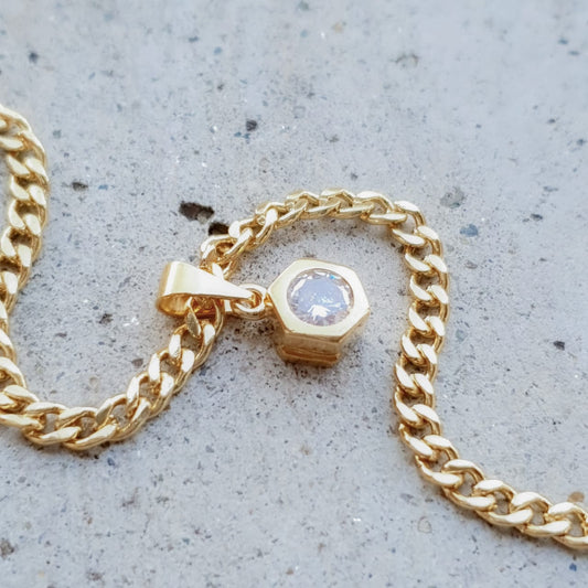 23067C - Dije Hexágono Circonia Cristal