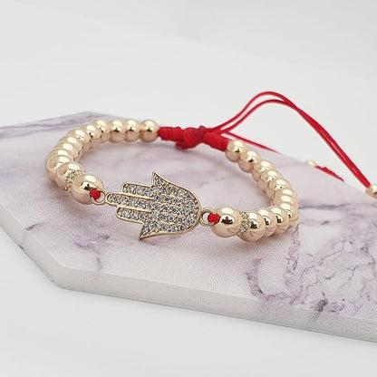 24396 - Herraje Mano Hamsa Circonias